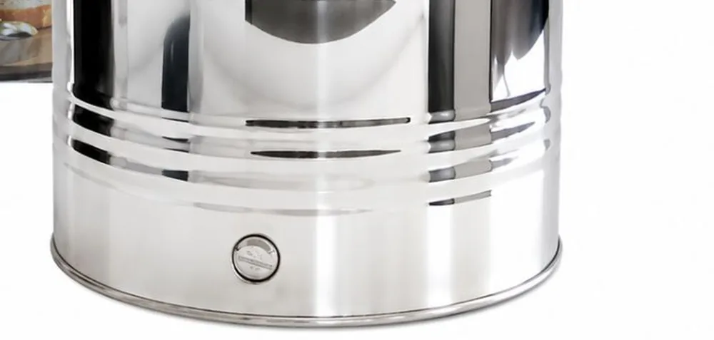 Close-up of the base of the Milano drum showing the integrated predisposition fitting for an optional tap (tap not included)